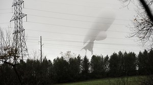 Crew works to recover runaway blimp