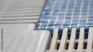 pool overflow grate. Swimming pool water pouring into the overflow grid. Swimming Pool Overflow Grating. Pool overflow system. Stock Video