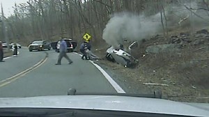 A dramatic rescue in Kinnelon is captured on police dash cam. The woman rescued is now facing charges. Story: http://bit.ly/1HhBjF7 | News 12 New Jersey