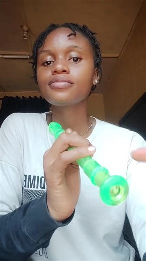 Playing happy birthday on the recorder.