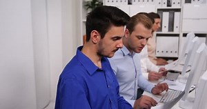 Young Group of Business People Work at Office Desk Discuss About Pie Chart Data