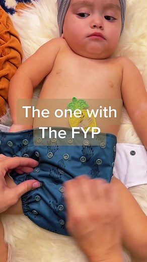 Adjusting the cloth diaper rise as you’re putting it on! #clothdiapertiktok #lighthousekidscompany #baby #gtubebaby