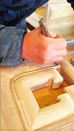 Chisel carves grooves, cabinet design emerges