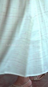 Soft checks, graceful details, and an easy silhouette - the Ornate Oasis Dress is your go-to for days that demand quiet elegance. Shop the look → | Saaki