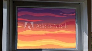 Landscape view of the sky at sunset seen from the window. The sun was setting from the bedroom window.