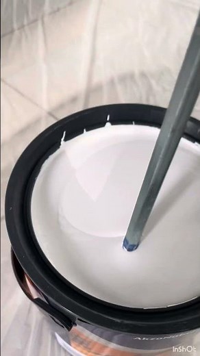 Painting and decorating paint opening and mixing Dulux easy care