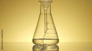 A moment of science water flow into test tube beaker laboratory equipment , science content