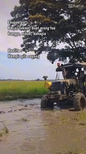 Tractor Struggles in Muddy Field: Battling Tough Terrain
