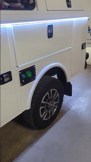 Knapheide service body lights under drip edge. Super bright for working at night. Wire to aux switch