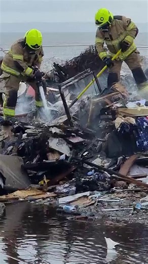 Fire crews have spent the day battling a blaze on Rover Way in Cardiff, which brought traffic to a standstill on a major road into the city. South Wales Fire and Rescue Service were called to the scene in Pengam Green just before 10am, warning residents to keep windows and doors closed due to heavy smoke in the area. Footage from the scene show firefighters tackling the fire on grassland next to the road. | WalesOnline