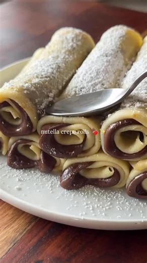 Delights Foods on Instagram: "Nutella crepe rolls 🍫✨ Full recipe is on my website link in bio 🔗 #nutella #crepes #easyrecipes #comfortfood"