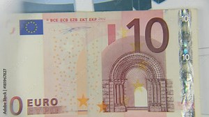 Consider a banknote of ten euros, an increase with a magnifying glass.