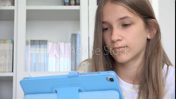 Child Playing Tablet Browsing Internet, Kid Using Touchscreen Device, Blonde Girl Writing Reading Messages, Teenager Online Gaming