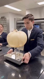 Would you try *Poularde de Bresse en vessie* (Bresse chicken cooked in a pig bladder)? 🤯🤷🏽‍♂️ This exquisite dish is served at Epicure, a 3-Michelin Star restaurant located in Le Bristol Hotel, Paris. The chicken is first infused with truffle oil and other aromatics, and then put a pig's bladder, which has been turned inside-out, to avoid any potential flavour pollution. Next, the tied-up bladder is placed in a chicken broth and poached for 40-60 minutes, the poaching creating a steaming effe