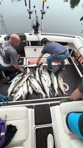 Kelly and Blake unloading ludington salmon