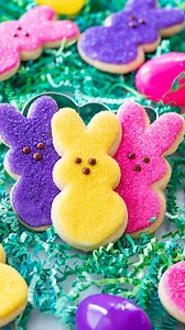 Step aside, carrot cake–these Easter sugar cookies are about to take over as the star of the Easter dessert table! With their colorfully sugared bodies and and tiny icing faces, these cookies look just like your favorite marshmallow Peeps, minus the gooey filling. Besides their obvious cuteness, these cookies are so easy and fun to make, especially with your kids! For the recipe, comment “recipe” or find it here: https://sugarspunrun.com/easter-sugar-cookies/ #peeps #peepcookies #easter #easteco