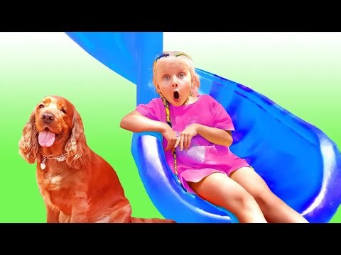 Little girl plays wtih magical Giant slide