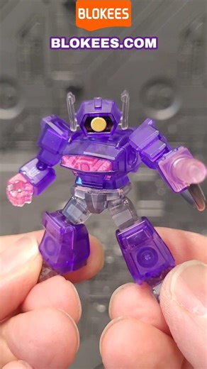2.2K views · 1.1K reactions | Quick Assembly: Blokees Shockwave from their Defender Version 03 set. This is the first time we're seeing Shockwave in the Defender class, and he looks sweet! Even sweeter cuz he resembles a grape Jolly Rancher!  Loving the detail and deco on this guy! #transformers #decepticons #Shockwave #Blokees #blokeestransformers #transformersblokees | Bot Bender Orinj | Facebook