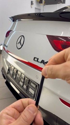 Mercedes AMG Sporty Red & Black Stripe Customization Tutorial. In this short tutorial, we show how to give the Mercedes CLA 45 AMG S a more aggressive and sporty look with a simple but powerful customization. We add a red vinyl stripe on the lower part of the rear bumper, plus a thin black stripe above it, perfectly matching the emblem design (black letters and red background in the “S”). This detail ties the whole car’s styling together and highlights its AMG character.Step by step process:🧼 C