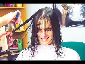 Layering woman long hair with bangs
