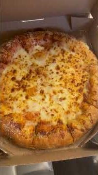 Homemade chicken wings, Domino’s stuffed crust, cheese, pizza, and Domino’s silent sauce