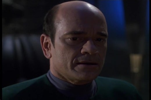 Starfleet Records. Starfleet Personnel: Kathryn M. Janeway, Captain of the USS Voyager. Discussing the canon: The Hirogen. Has The Doctor violated the Orders, Regulations, Protocols, etc. of Starfleet or not? Iden, however, doesn't trust her. She says she will deactivate them by force, and he fires and jumps to warp. The Doctor, unhappy with the captain's decision, loads himself into the mobile emitter, and gives the holograms Voyager's shield frequencies to beam him aboard. He will help them co