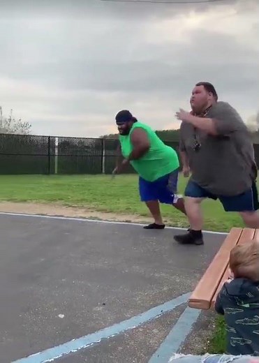 two fat people run a race! Big guy falls hard
