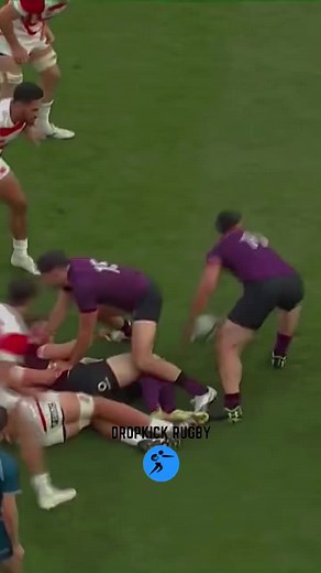 Exciting Rugby Match Highlights: Purple vs. Striped Teams