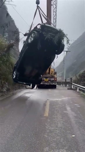 Crane Lifts Severely Deformed Vehicle, Shocking Scene