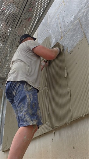 Applying glue on EPS #facade #construction #insulation #styrofoam #plaster #decor