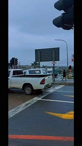 Mthatha wears a grey coat today ☁️—thick clouds blanket the sky, casting a moody tone over the town. The roads shimmer with leftover rain 🌧️, the tar glistening like spilled ink under the dull light. Potholes hide in plain sight 🕳️, filled with muddy water, and each step feels like a calculated risk 🫣. Minibus taxis splash past 🚐💦, and people move with purpose, shoulders hunched against the chill 🧥. It’s the kind of weather that makes the town feel slow, reflective—even a little poetic ✍️.