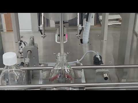 IQ-BTL Single Station Bottle Filling Machine filling 250ml bottles.