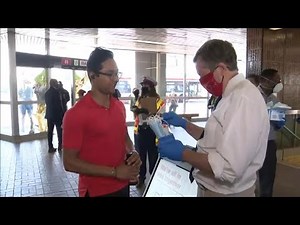 Mayor Tory hands out masks as face coverings become mandatory on TTC