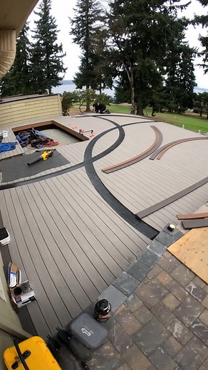Installing the curved inlays on our current #deck project. #drdecks #yourprescriptionforquality #timbertech #azek #heatcon #deckboardbending #curves