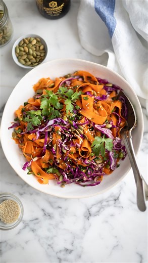 Carrot and Red Cabbage Salad with Citrus Ginger Dressing I’ve been eating this delicious carrot salad on repeat. Think crunchy carrot ribbons, shaved red cabbage, and a citrus ginger dressing that's so delicious. It’s got Fresh orange lime juice, toasted sesame oil, ginger, chilli crisp and a sneaky bit of fish sauce for umami depth. It's sweet, tangy, spicy and completely addictive. I've been pairing it with leftover roast chicken, grilled fish, or honestly just eating it straight from the bowl