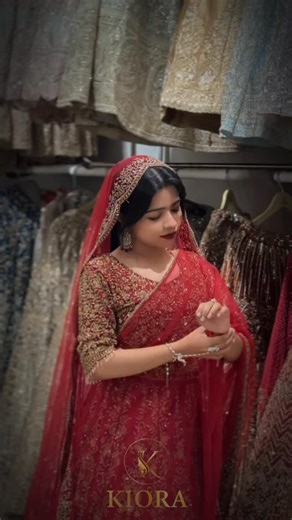 Kiora_premium_bridal_outfits on Instagram: "A vision of royalty in every step ❤️ This premium Pakistani bridal outfit is drenched in deep ruby red hues, adorned with intricate gold embroidery that speaks pure elegance. From the heavily detailed blouse to the flowing lehenga and sheer royal dupatta — every inch reflects timeless bridal luxury ✨ Designed for brides who want a grand, regal entrance without the heavy price tag. Available exclusively on rent at KIORA — where bridal dreams turn into r