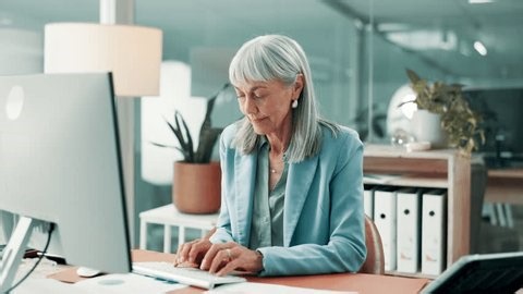 clip-4017666001-woman-typing-email-office-computer-data-analysis