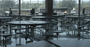 High School Cafeteria with Students Walking by on their way to Class