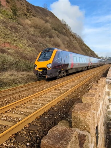 a @CrossCountry Trains voyager passes sprey point near teignmouth on the