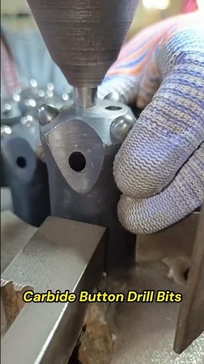 Insert Carbide Buttons into a Drill Bit