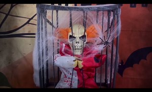 Screaming Halloween Decorations, Animated Halloween Decor,Clown Scary Skull Cage Prop with Motion Activated, Spooky Hanging Ghost Light Up Eyes for Haunted House Indoor Outdoor Decor