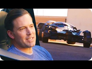 'Batman v Superman' star Ben Affleck takes a fan for a spin in the Batmobile