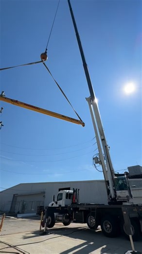How we get the solar array onto a catamaran. A crane helps a lot! This refit is coming together nicely, nice big 48v lithium battery bank, inverter chargers, watermaker, and much more! #theyachtrigger #boats #catamarans | The Yacht Rigger