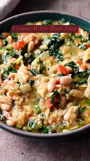 This Creamy White Bean Soup with Kale is a creamy yet healthy one-pot soup that's enhanced with three easy but gourmet flavor boosters! Vegan, gluten-free, and weeknight-friendly. Includes Instant Pot instructions as well! 🍲 RECIPE IN COMMENTS BELOW! #soupseason #souprecipe #vegansoup #veggierecipes #cookingvideos | Rainbow Plant Life