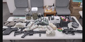 Local drug bust leads to the seizure of cash, drugs, and weapons