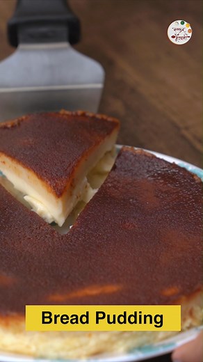 ब्रेड पुडिंग 😍 Bread Pudding commonly known as Caramel Pudding or Caramel Custard is a popular dessert recipe which is craved and loved by one and all. This Christmas or New Year festive you can try this Bread Pudding dessert recipe at home for your kids and family. Ingredients: (Serves 4) - 4 Bread Slices - 1 cup Milk - 2 Eggs - 3-4 tbsp Sugar - 1/2 tsp Green Cardamom Powder - Sugar - 1/2 tsp Green Cardamom Powder (sprinkle) Method: 1. Take small pieces of bread slices, add milk, eggs, sugar, 
