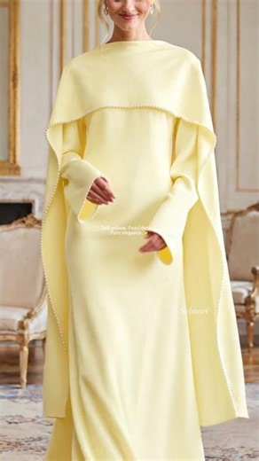A soft yellow cape dress made for elegant entrances ✨