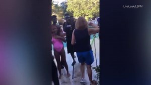 Elderly woman with two dogs body slammed, thrown into pool