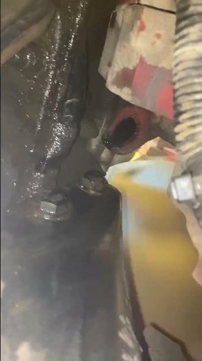 Oil leaking from the blow-by tube on a Cummins engine typically indicates excessive pressure.