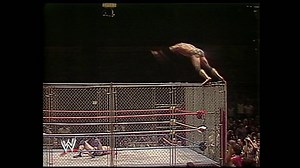Superstars jumping off the top of the cage: WWE.com Highlight Reel